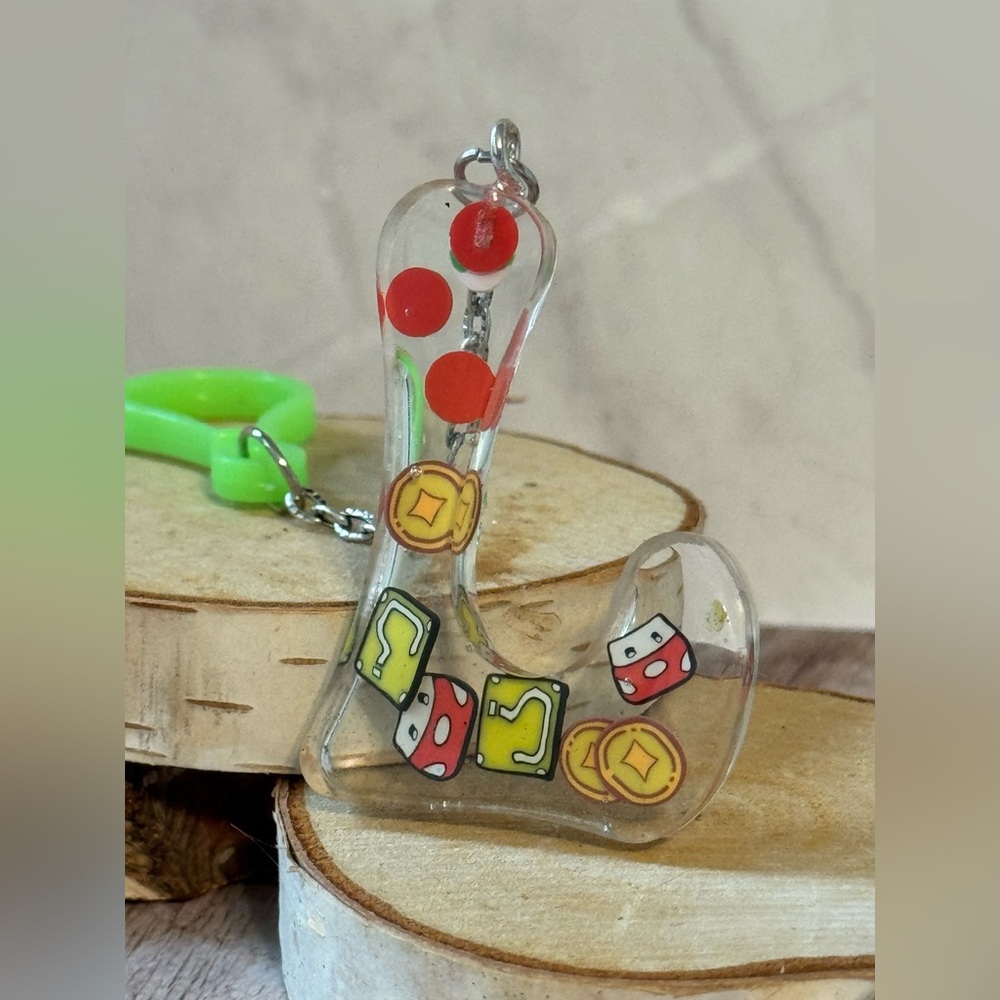 Letter L with video game inspired charms newly made.